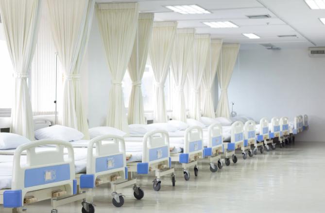 A line of hospital beds fitted with anti static wheels and castors which are essential for reducing the potential dangers of static shocks in healthcare settings.